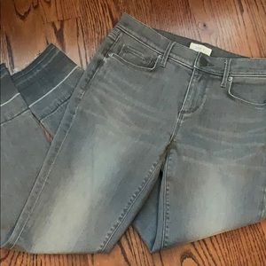 Grey distressed skinny jeans